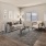 living area that includes ample seating spaces and bright lighting