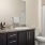 a bathroom with a marble countertop